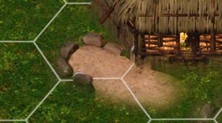 An ancestor grave mound beside a settlement building.