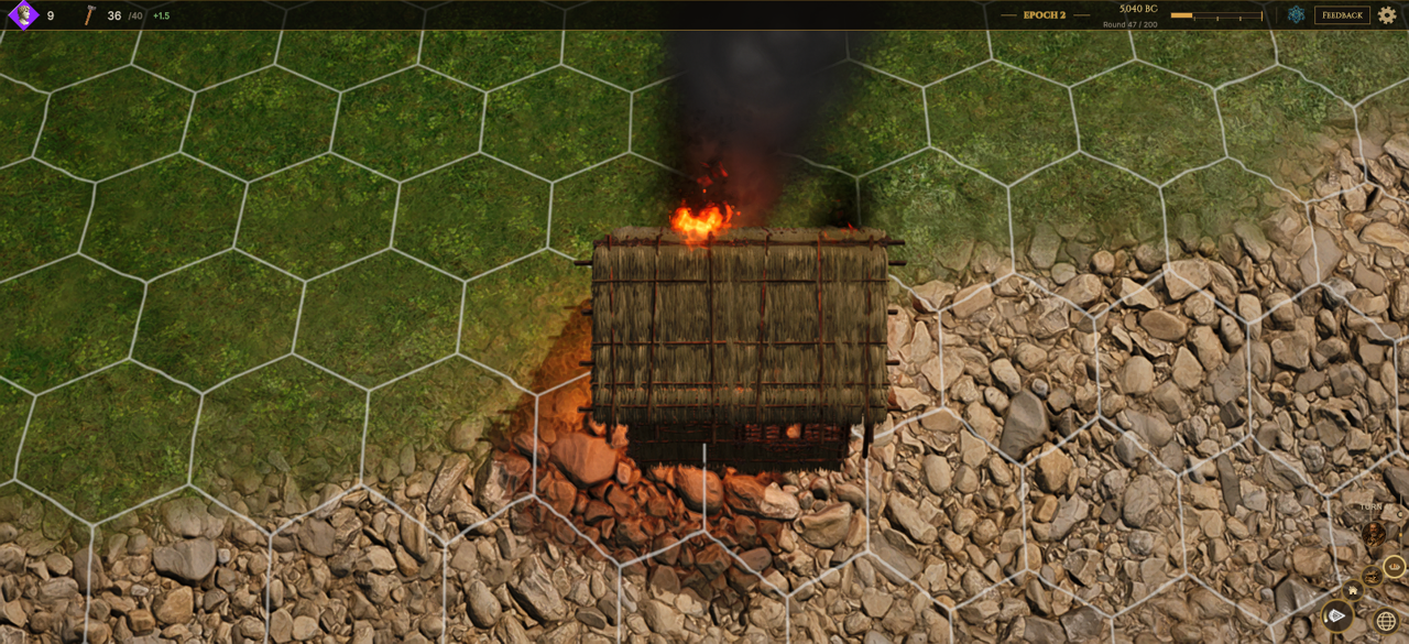 A razed village burns.